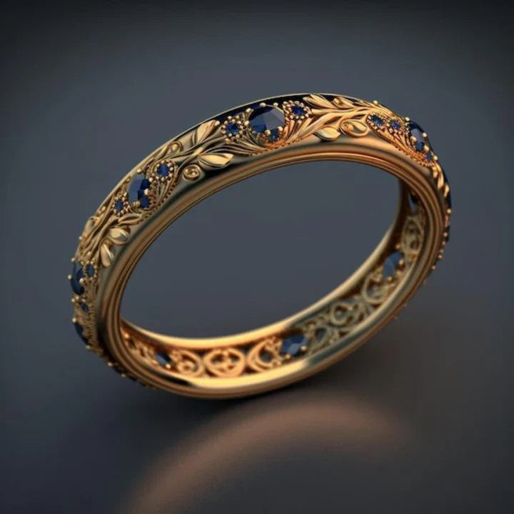 Anello Esotico con Foglia di Zirconi Blu: Eleganza Unica per Ogni Occasione 0