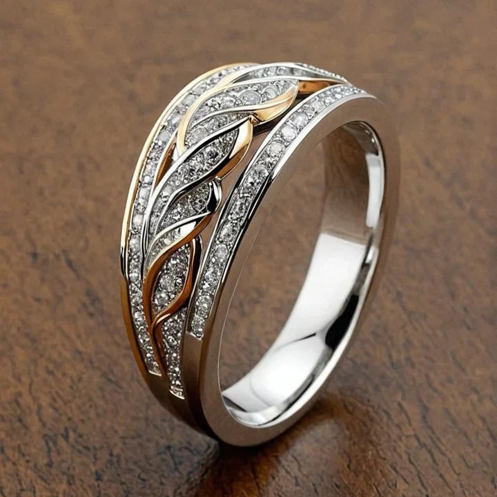 Anello Intrecciato Oro e Argento: Eleganza Unica per Ogni Occasione 0