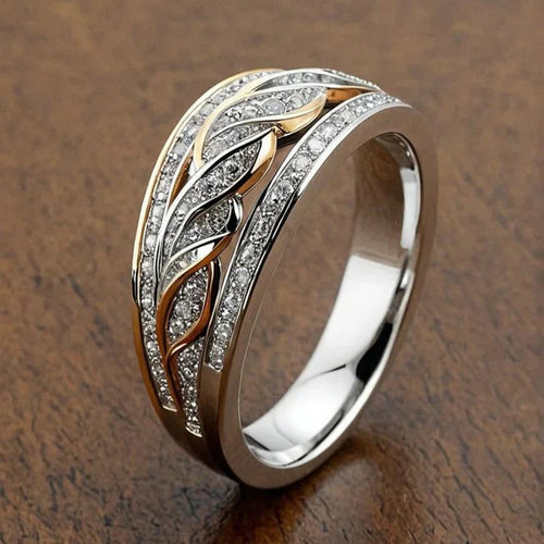 Anello Intrecciato Oro e Argento: Eleganza Unica per Ogni Occasione 0